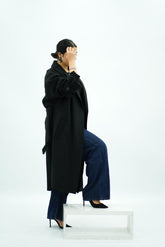 Manteau oversize noir avec ceinture