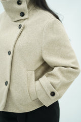Manteau court col montant