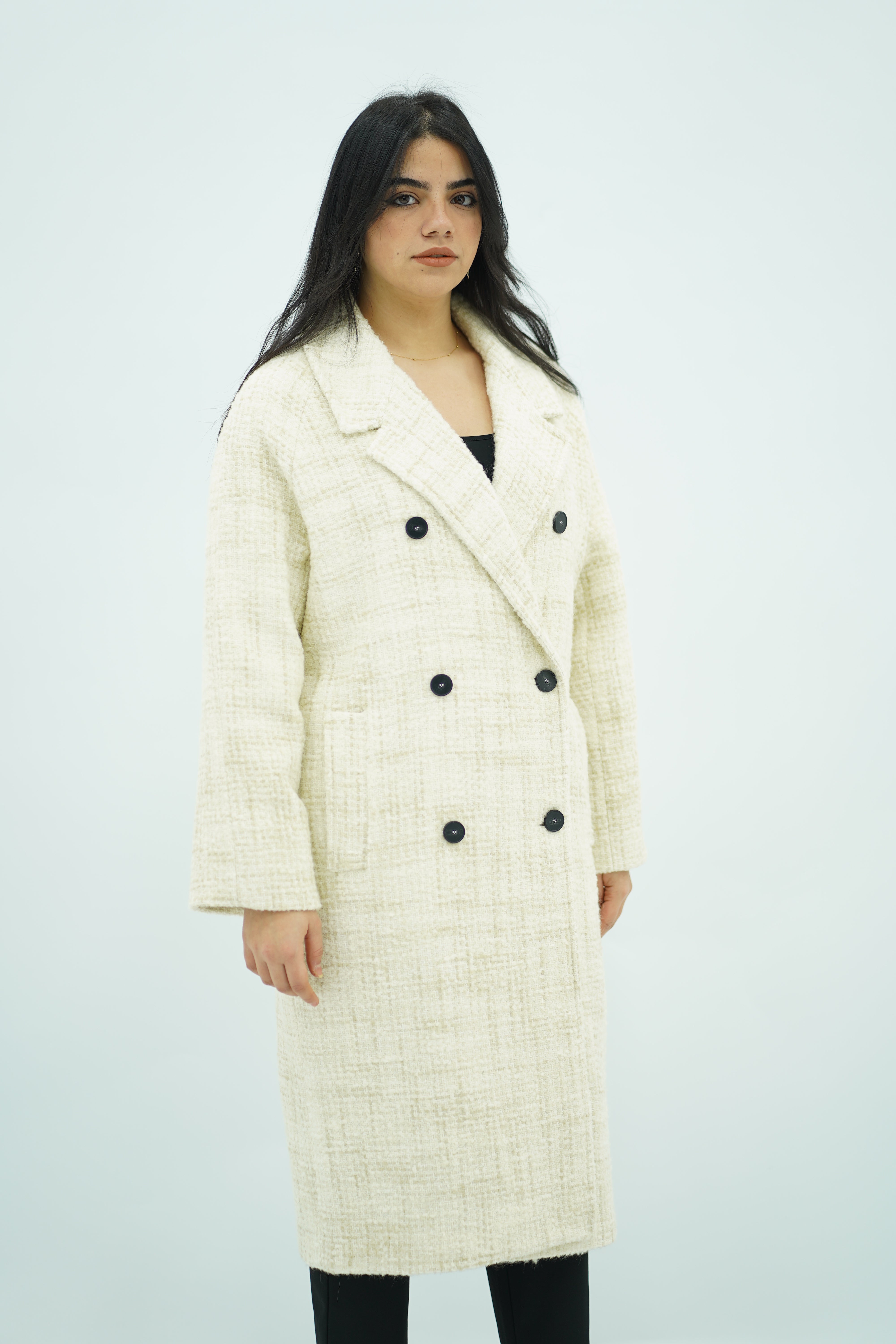 Manteau long écru texturé
