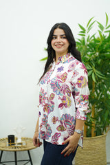 Chemise blanche à l’imprimé floral