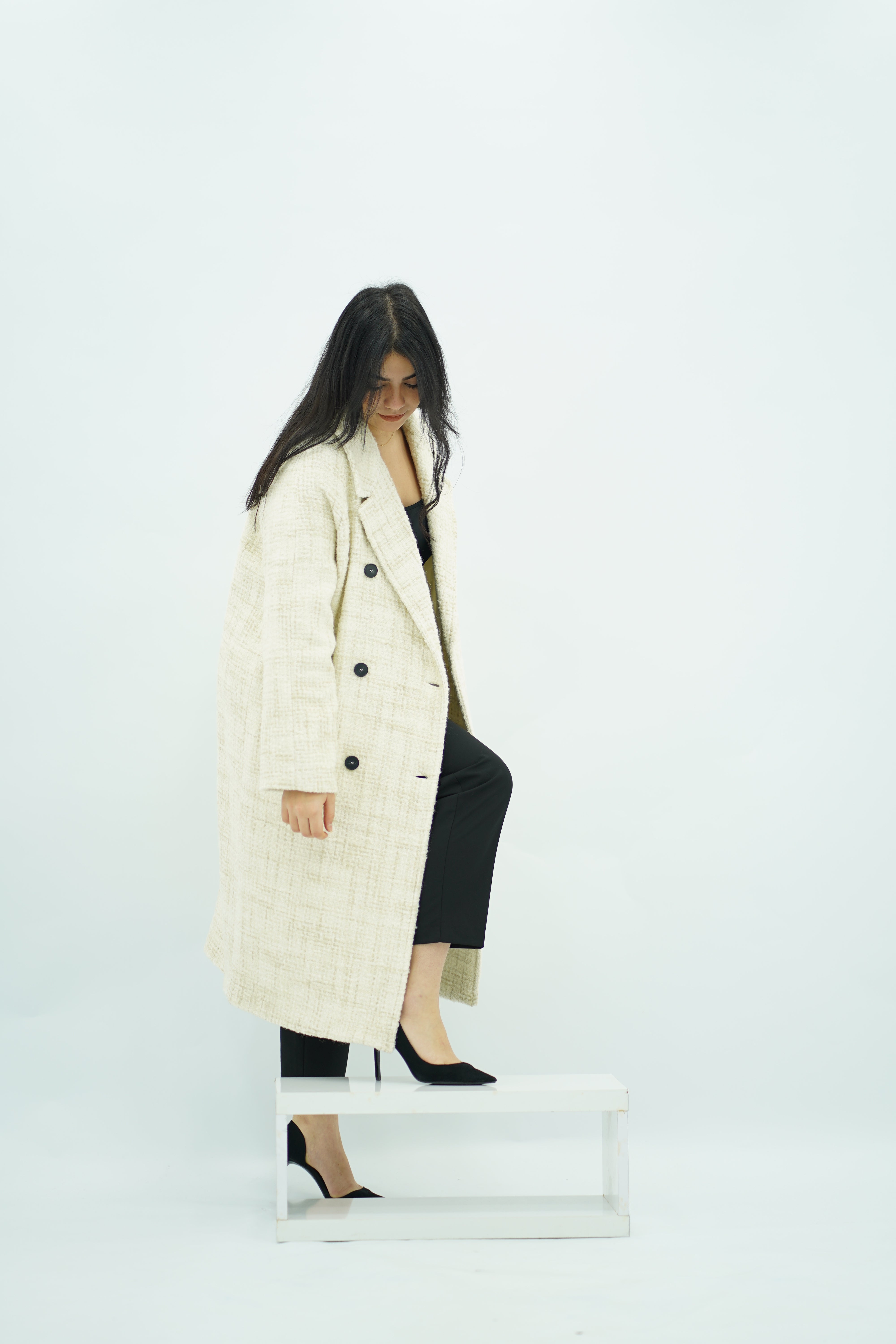 Manteau long écru texturé