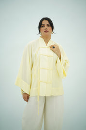 Chemise plissé en jaune pastel