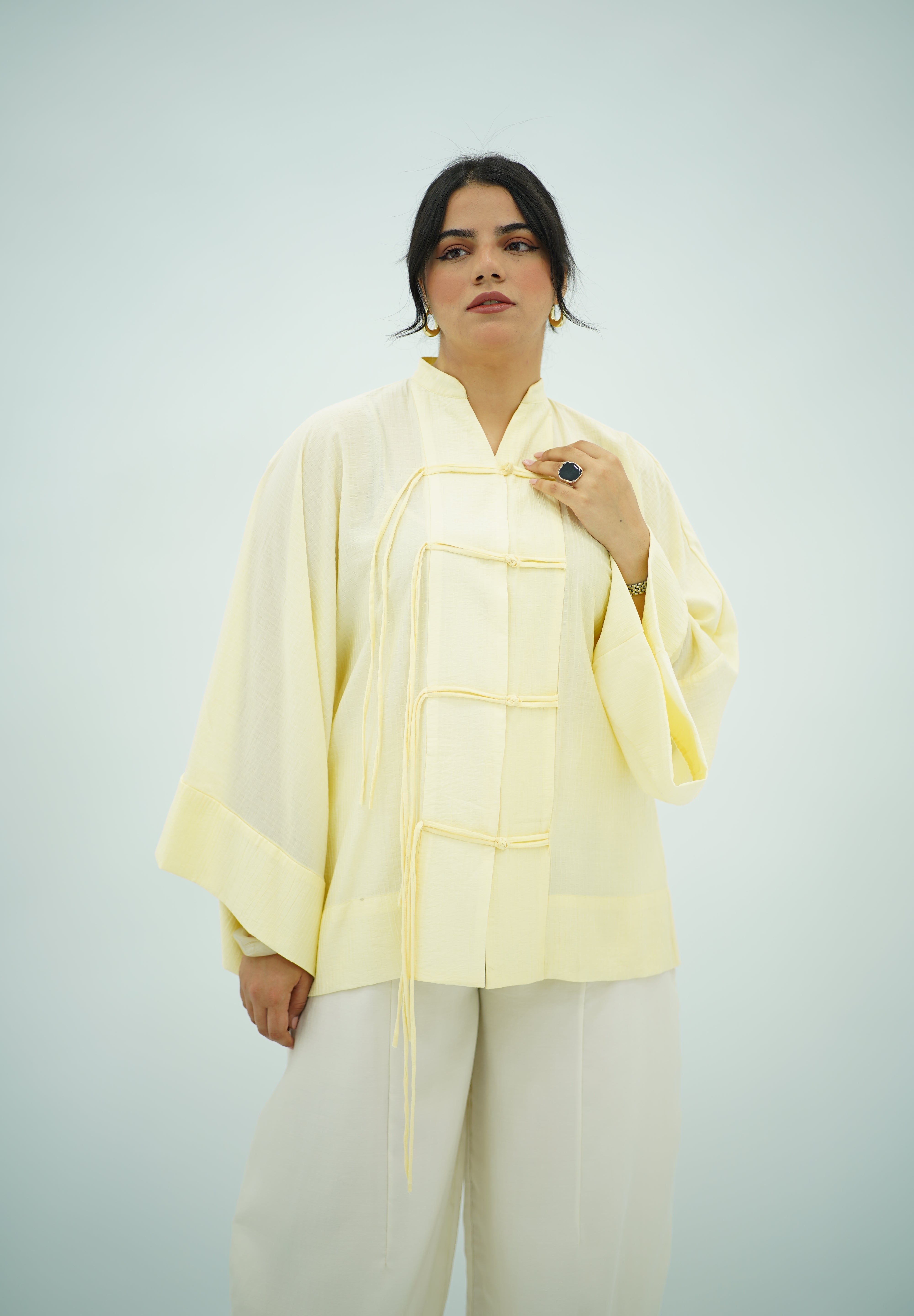 Chemise plissé en jaune pastel