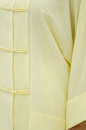 Chemise plissé en jaune pastel