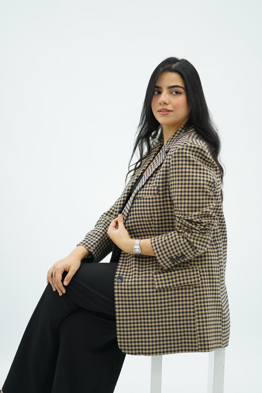 Veste à carreaux noire et beige