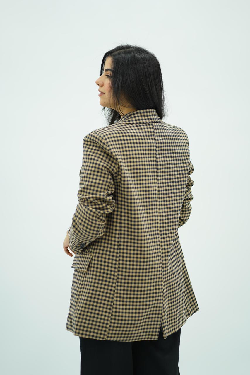 Veste à carreaux noire et beige