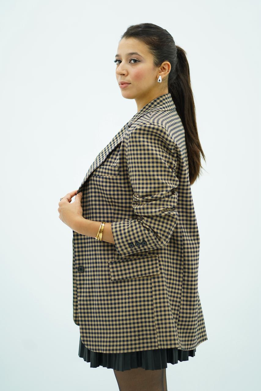 Veste à carreaux noire et beige