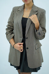 Veste à carreaux noire et beige
