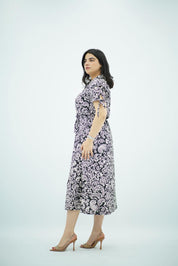 Robe mi-longue à imprimé avec nœuds aux manches