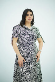 Robe mi-longue à imprimé avec nœuds aux manches