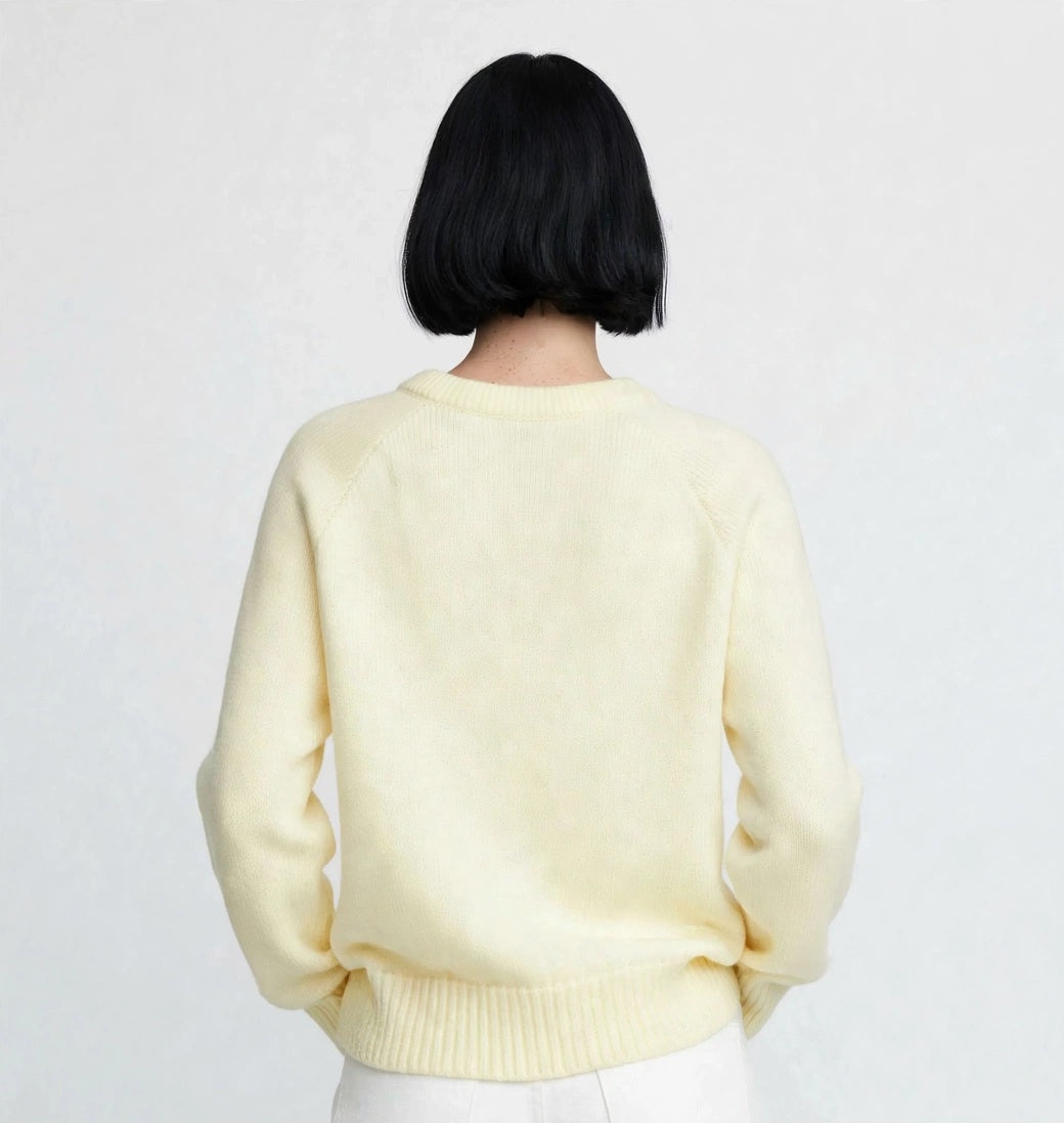 Pull en maille jaune pastel